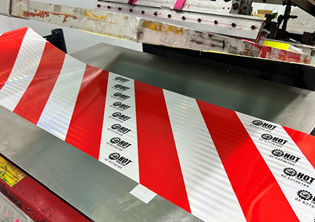 We supply Class 1 custom printed reflective chevron tape Australia wide