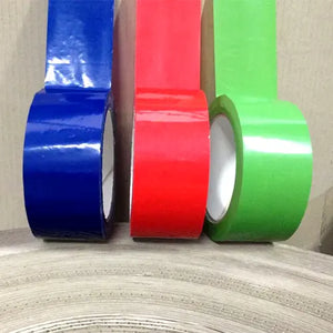 An assortment of heavy-duty colored PVC packaging tape rolls in red, blue, green, yellow, and orange for color-coding and inventory management.