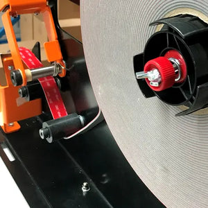 Tape Crew VHB Tape dispenser being used with 3M 4991 VHB Tape