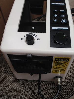 Easy to use Control Panel - M1000 Automatic Tape Dispenser. We supply our Automatic (Pre-Set Length )tape dispensers to Sydney & throughout Australia