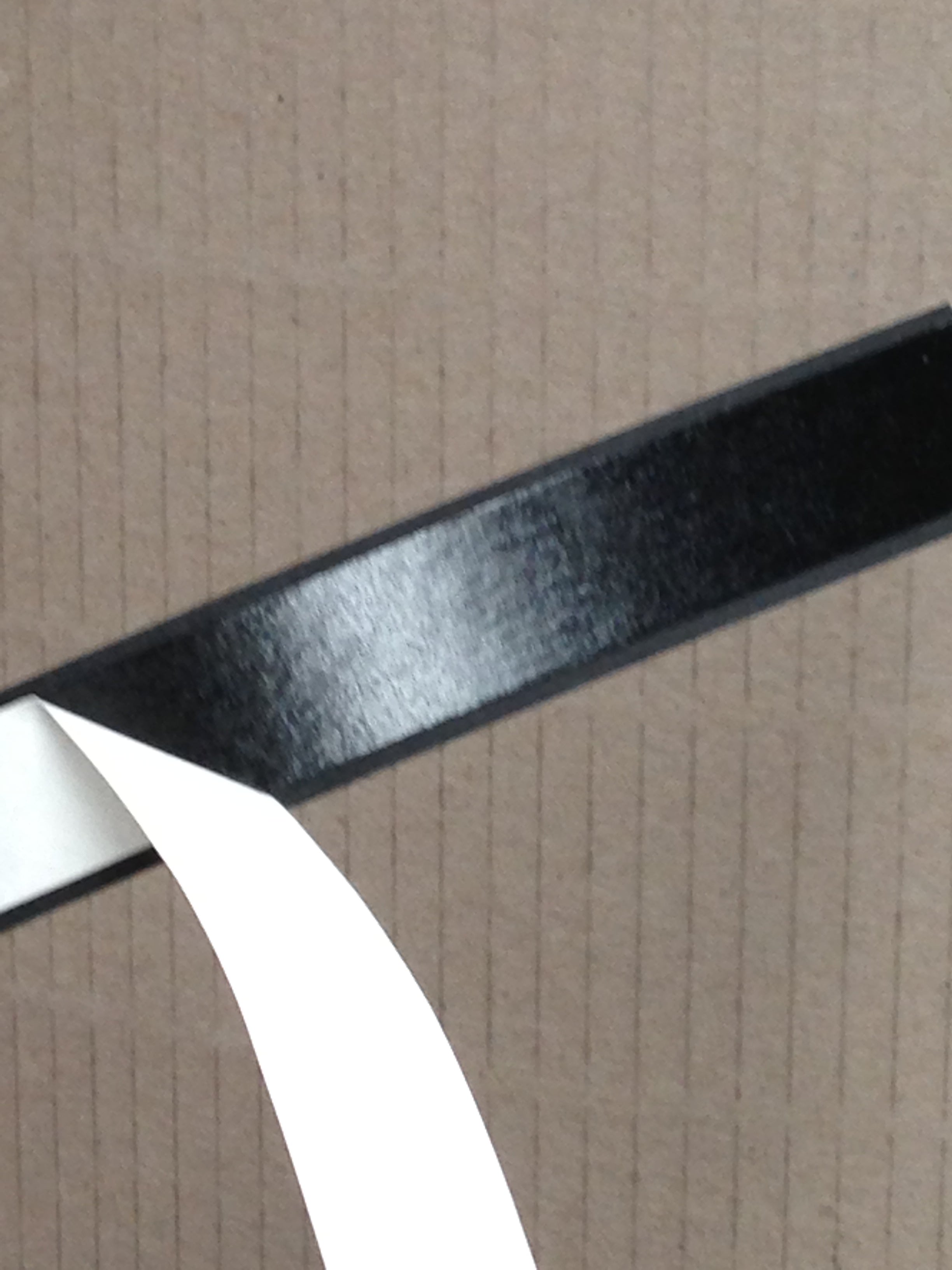 Double Sided Tape stuck to Melamine