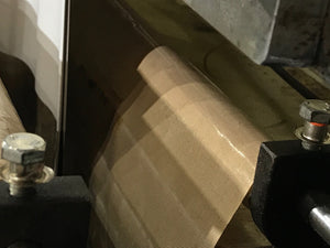 Tygaflor Teflon Tape applied to machinery. We supply Tygaflor Tape Australia Wide