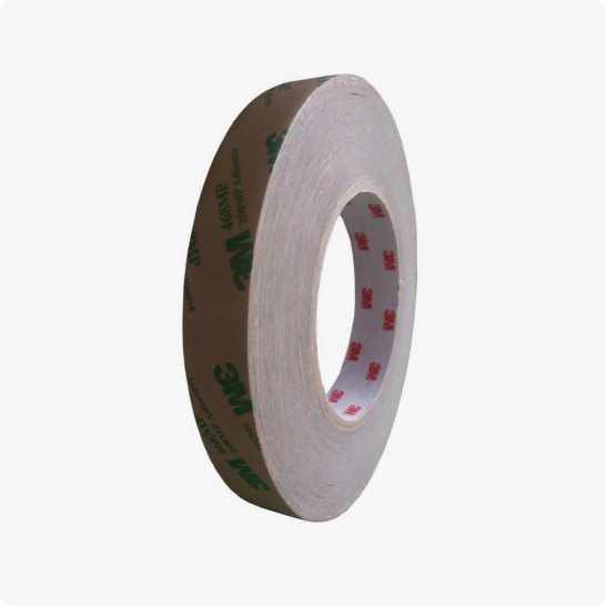 A roll of  custom cut 3M  468 - double-sided transfer tape.