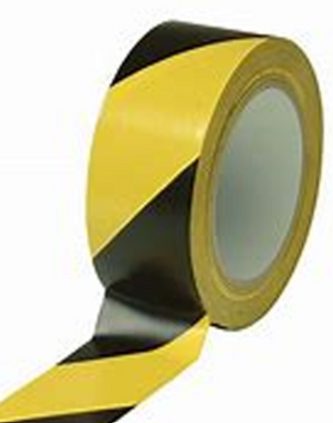 Roll of yellow and black striped lane safety marking tape