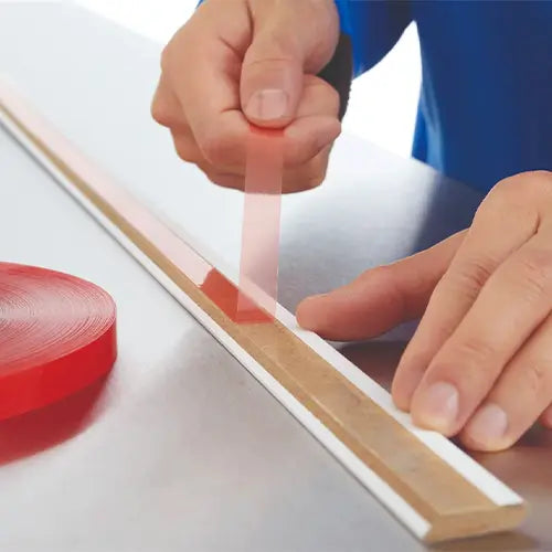 Tesa 4965 has a strong red liner which is easy to remove, wont tear.