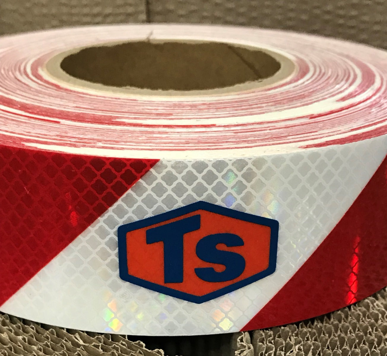 We custom print on Chevron reflective tape up to any width you require