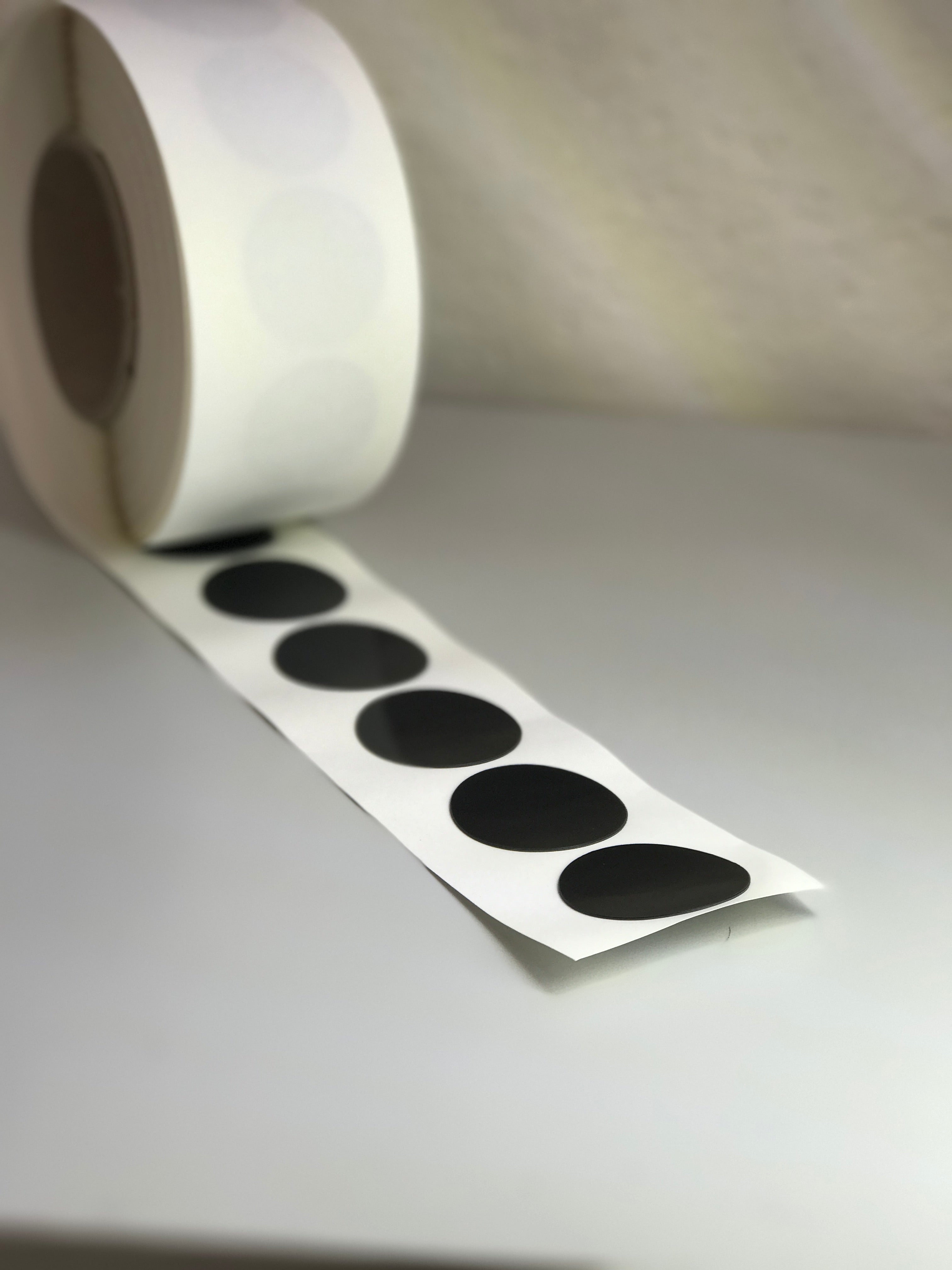 Die Cut Tape, Kiss Cut on a roll (meaning the die cut shape is left on the roll with the unwanted material removed)