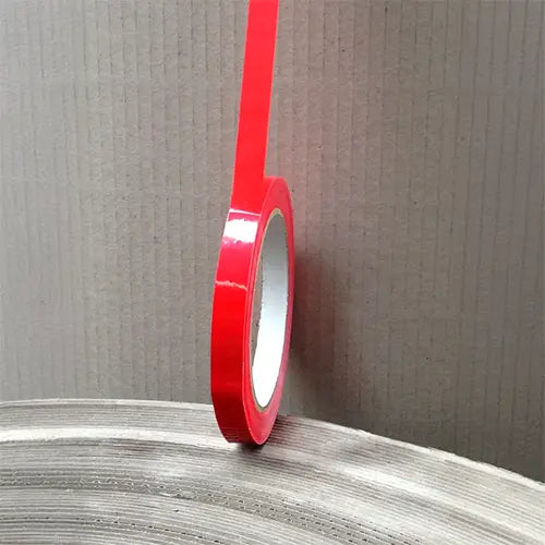 PVC packaging tape rolls in red for color-coding and inventory management.