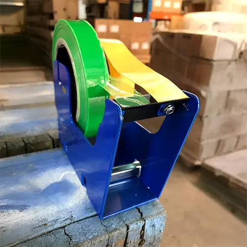 B3TC heavy-duty clamp-on tape dispenser mounted to packing bench.