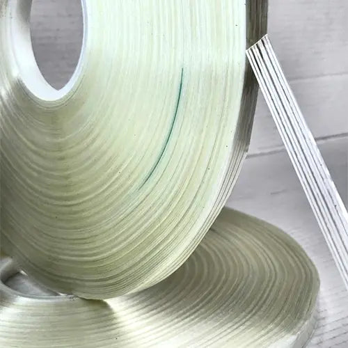 We can supply Machine length rolls of filament tape comparable to 3M 8981 - 12mm x 330mtr for use on "L Clipping" / Filament tape machines
