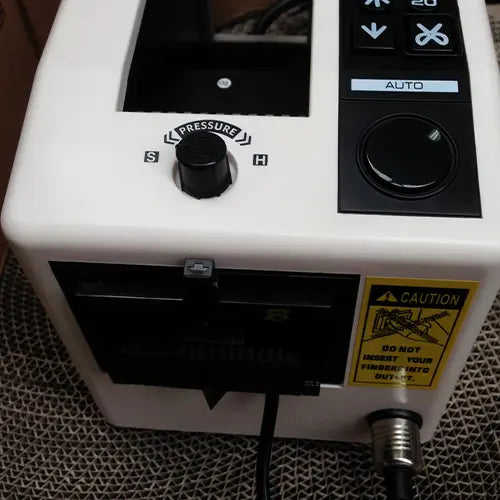 Easy to use Control Panel - M1000 Automatic Tape Dispenser. We supply our Automatic (Pre-Set Length )tape dispensers to Sydney & throughout Australia