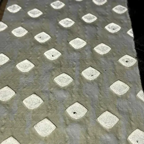 White. It can be used on a wide variety surfaces including Asphalt