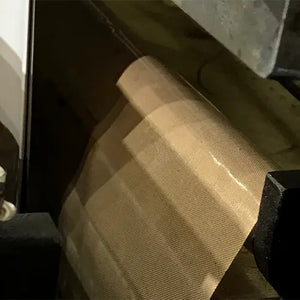Tygaflor Teflon Tape applied to machinery. We supply Tygaflor Tape Australia Wide