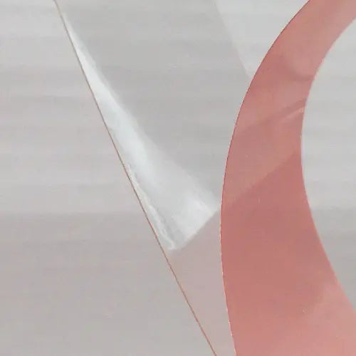 Tesa 4965  clear double sided tape with the red liner being removed