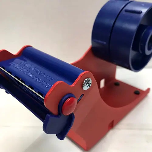 Tesa 6012 tape dispensers have safety covers for blades to prevent injuries