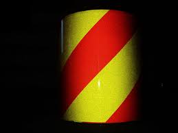 We supply Red/Yellow Diagonally Striped Reflective Tape in standard sizes as well as custom sizing