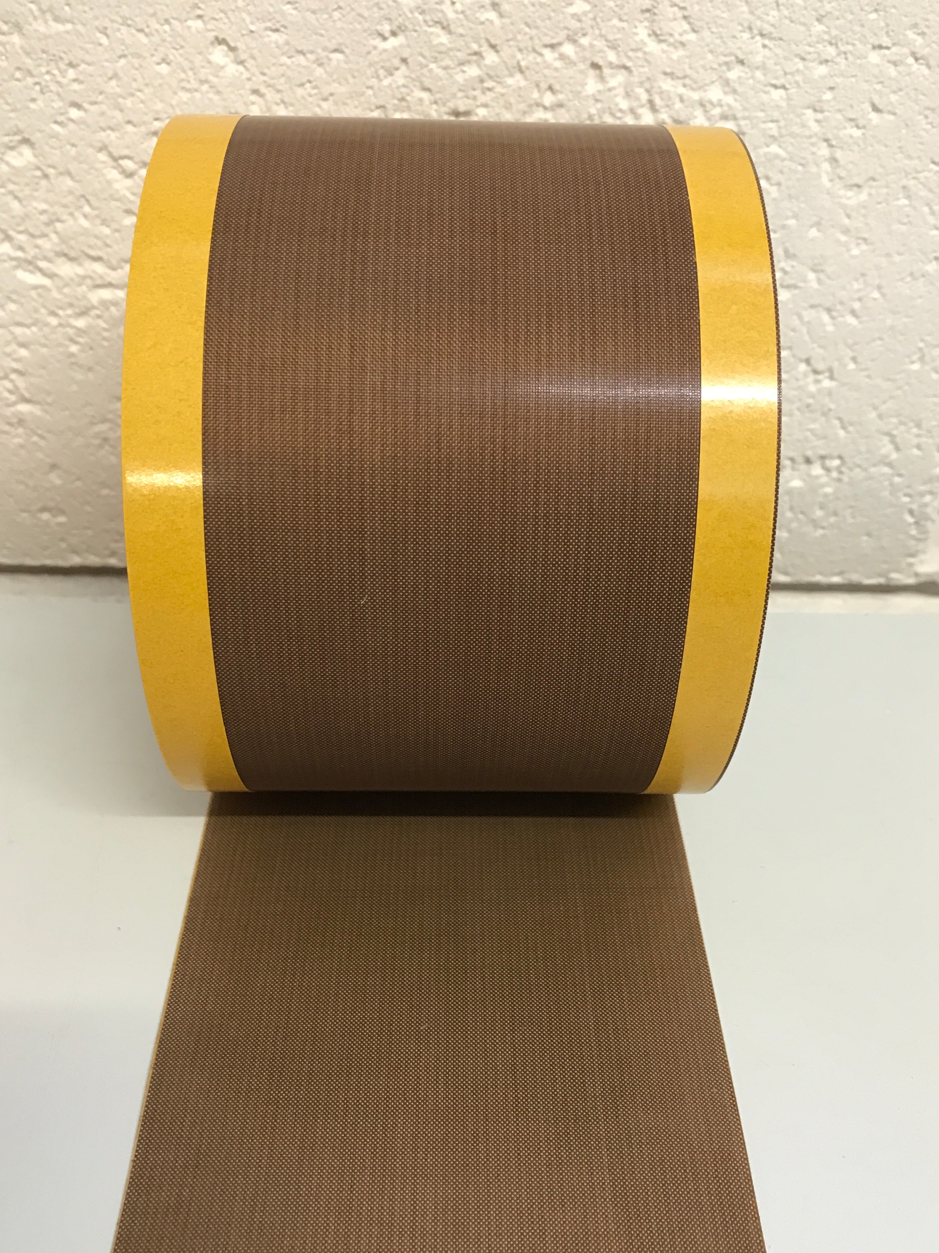 leaving a non-adhesive free area in the middle.