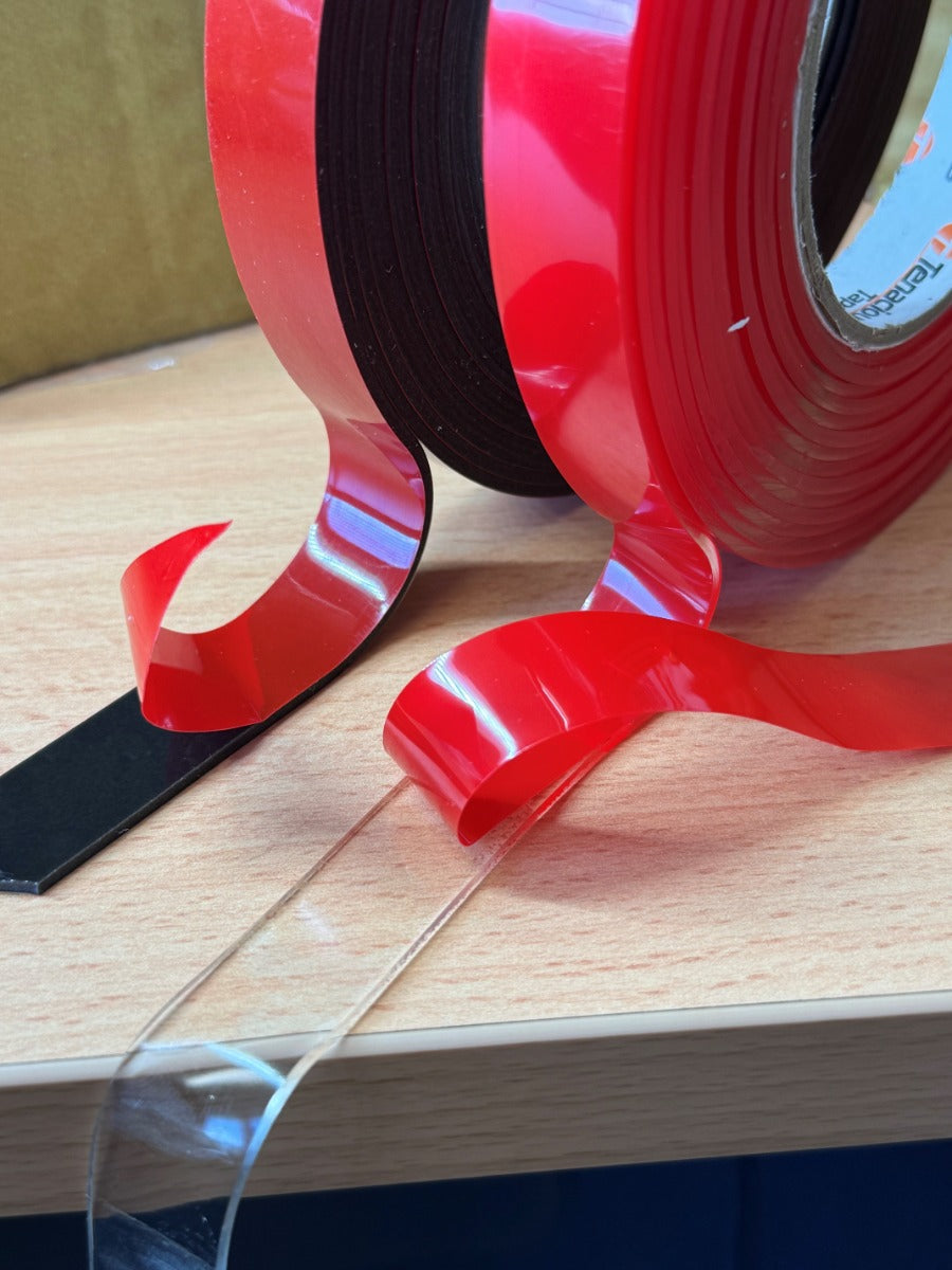 We custom custom 2mm thick clear, or black high bond double sided tape to any width required. order as little as 1 roll !