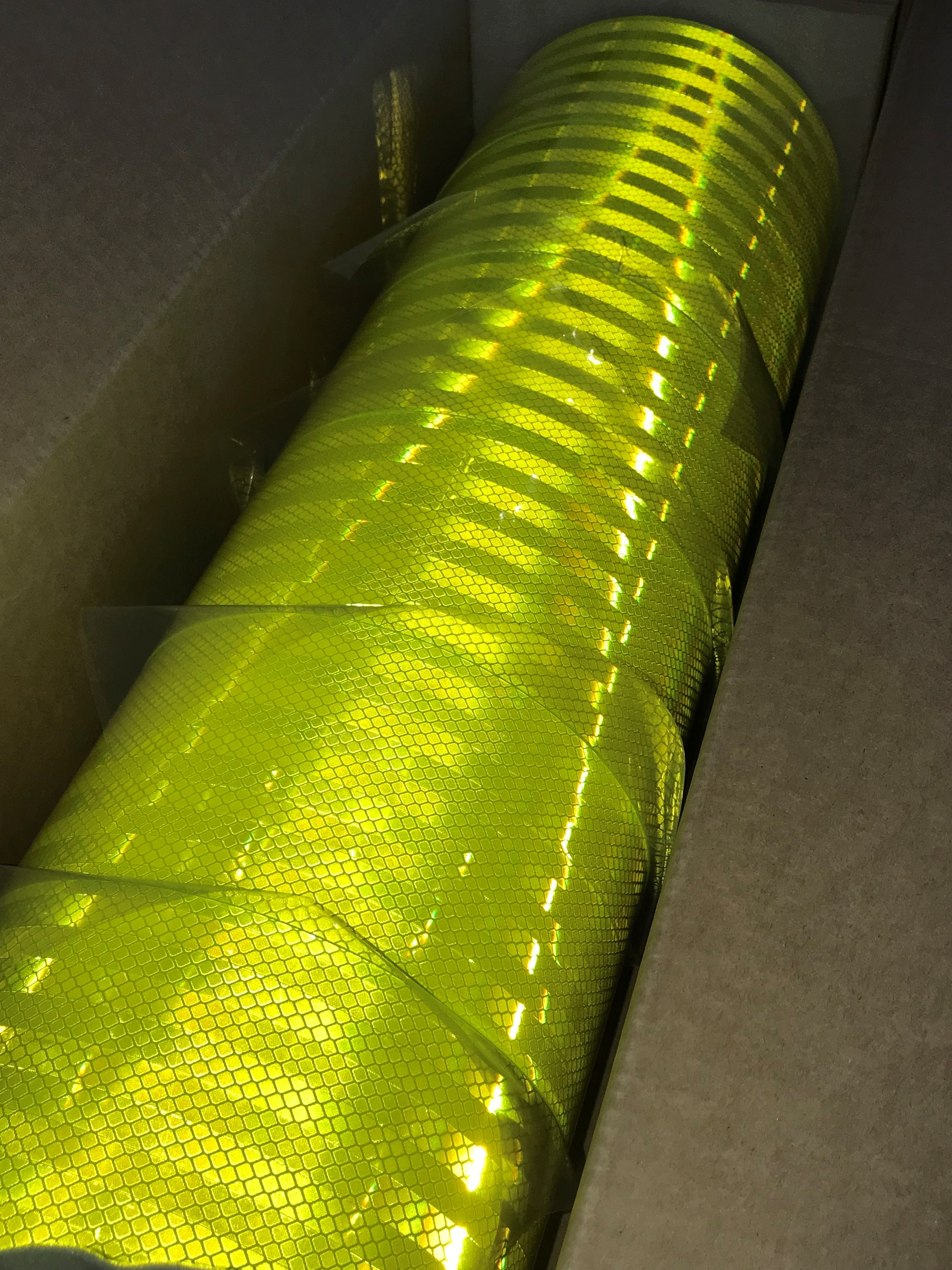 Fluro Yellow/Green Reflective Tape has a highly fluorescent layer which generates extra light, in daylight and twilight hours